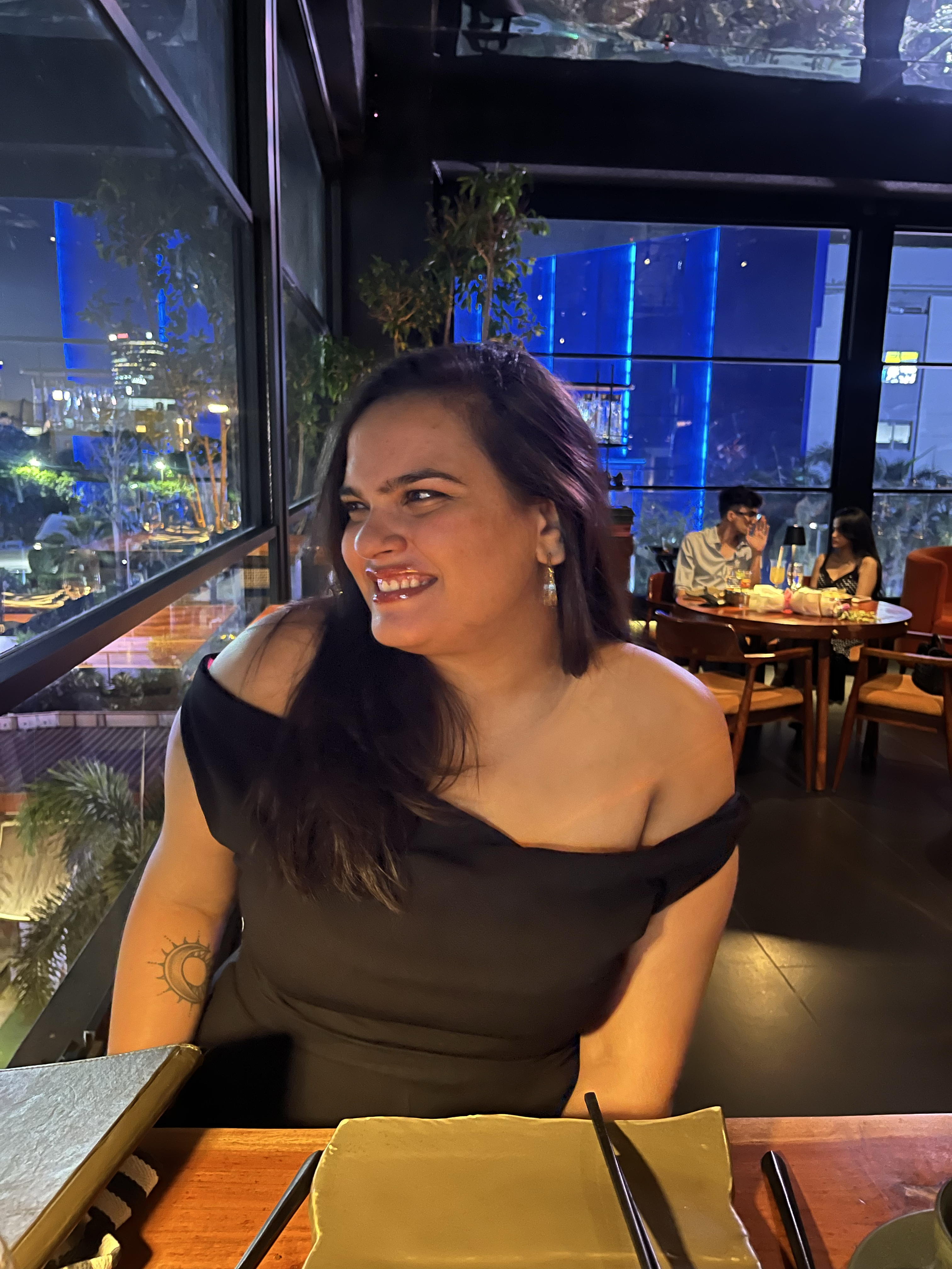 Aadishree Arora smiling at dinner