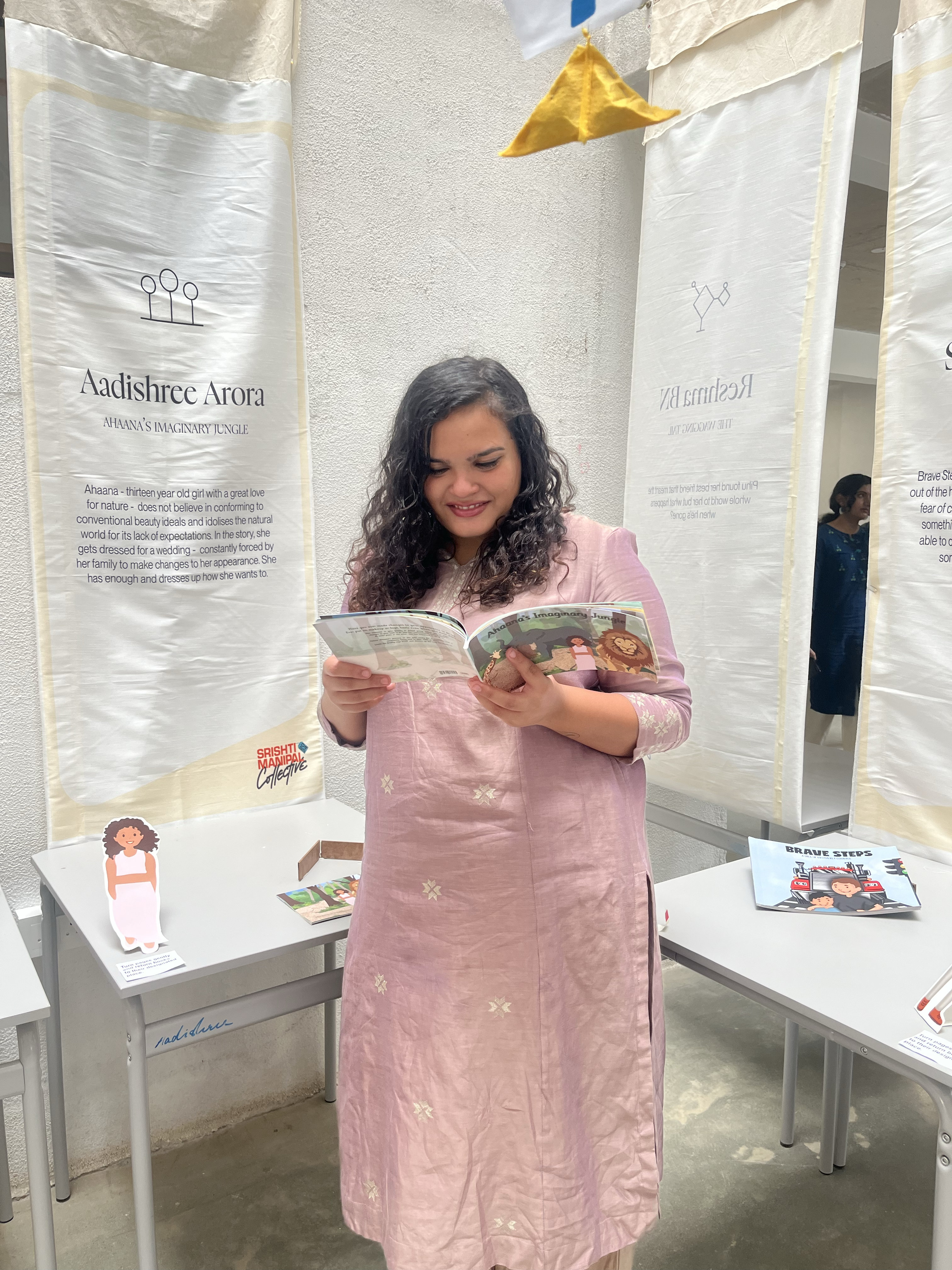 Aadishree Arora reading from her illustrated project